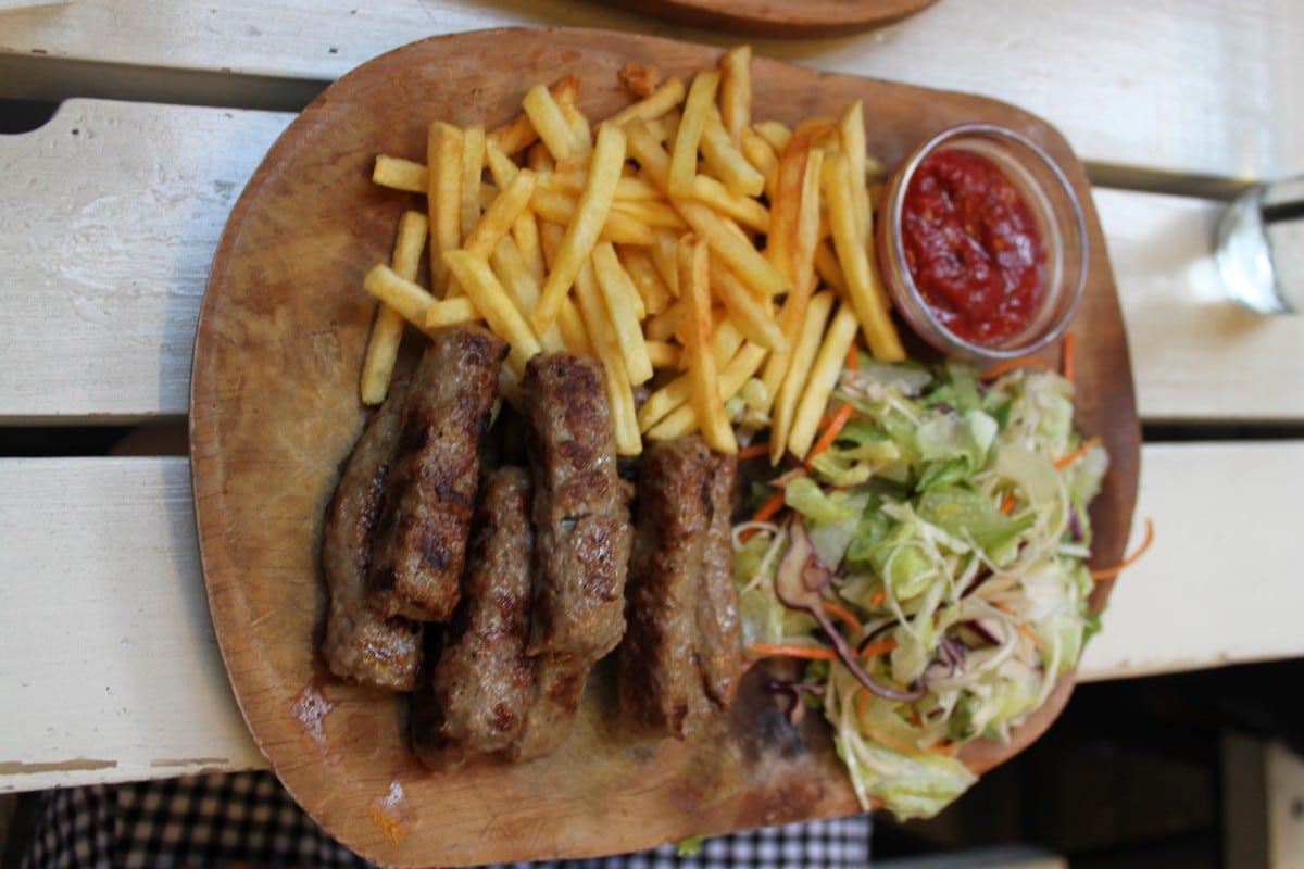 Eating Cevapi at Grillmania in Budapest
